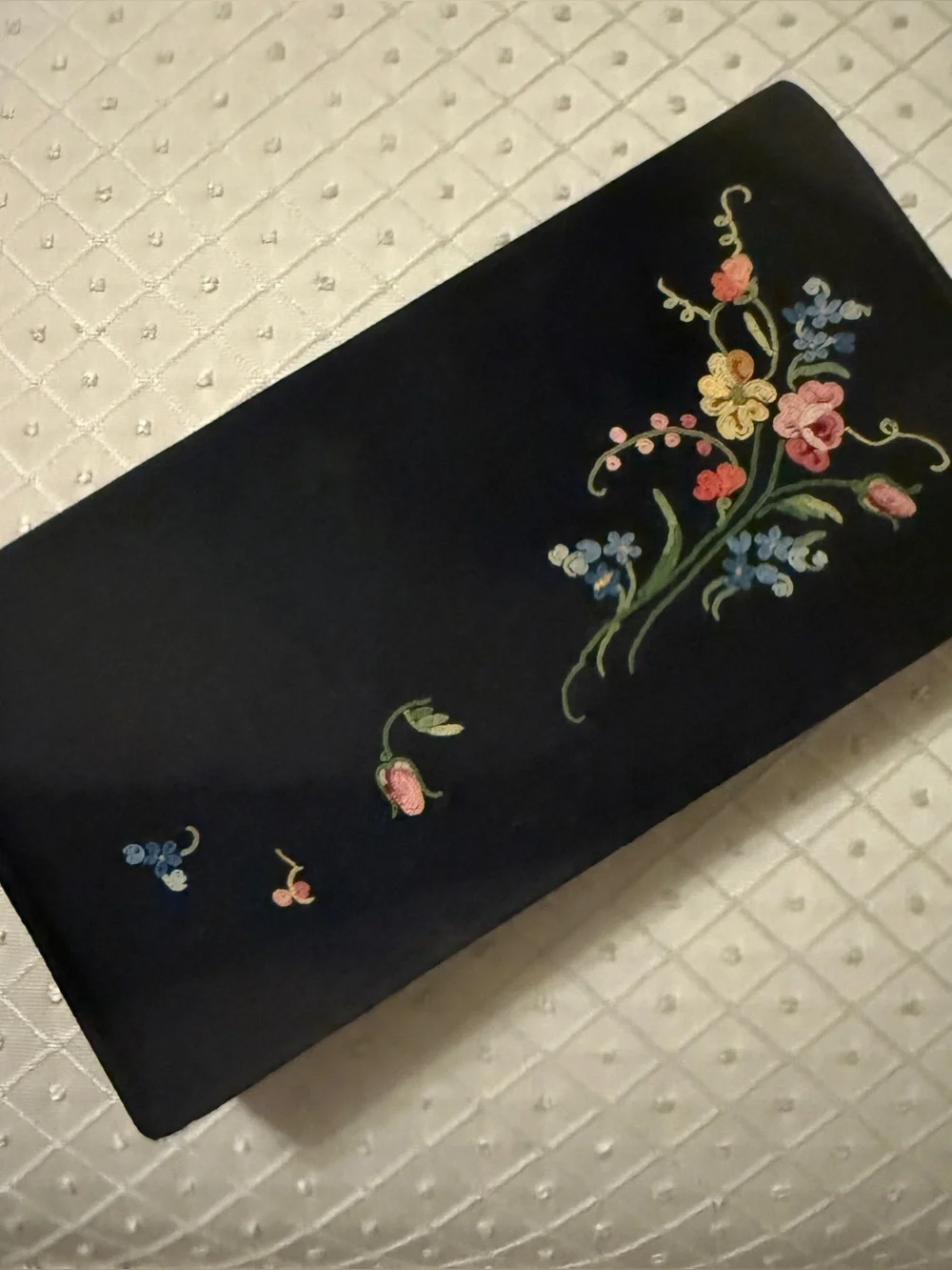 Anda black vintage clutch with matching mirrored compact. Made in France.